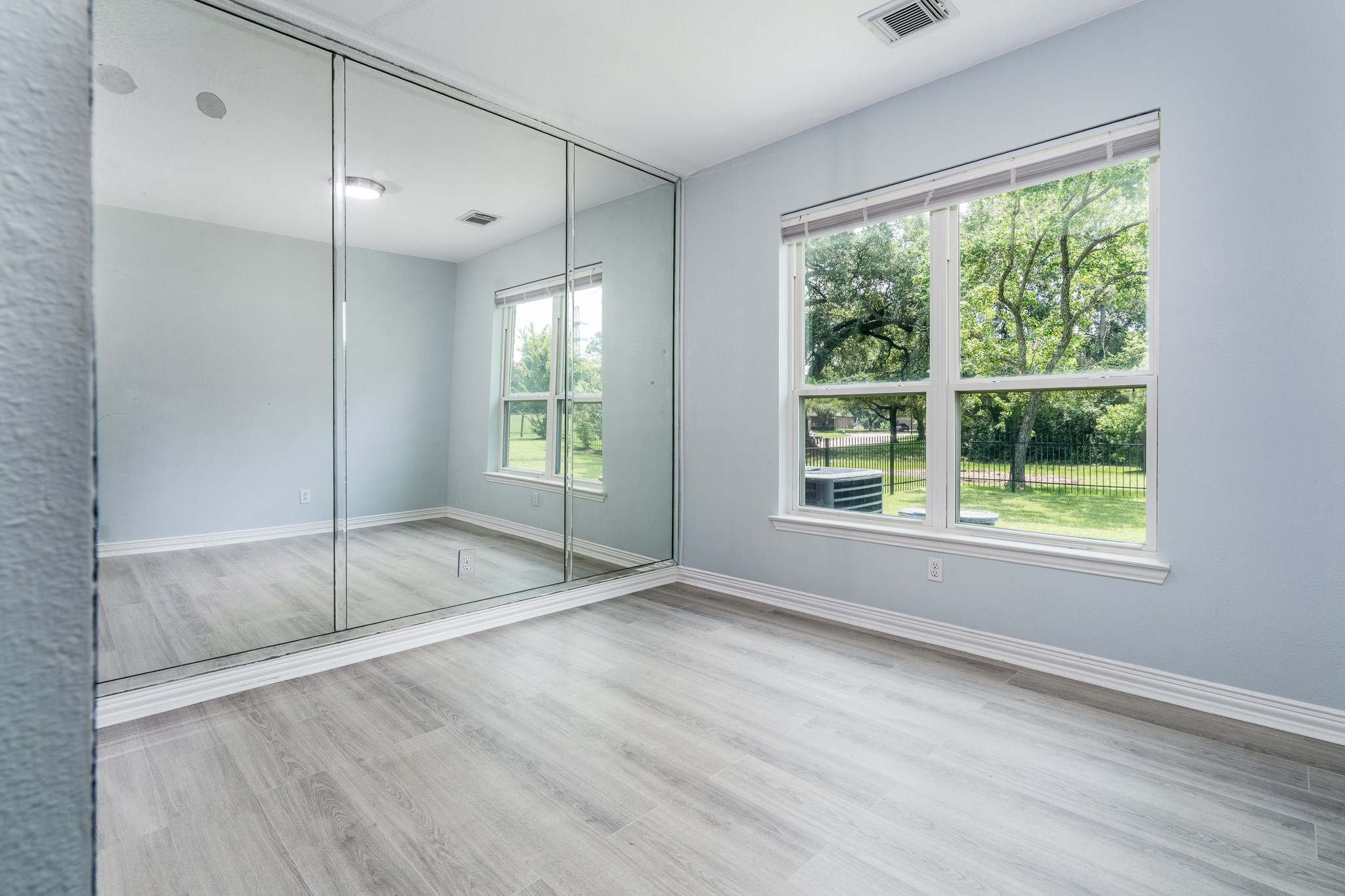 5914 Oakmoss Trail Spring, TX 77379 - Photo 20 of 50 Located off the primary bath is this private room perfect for an exercise room, nursery or extend the custom primary closet space! The choice is yours!