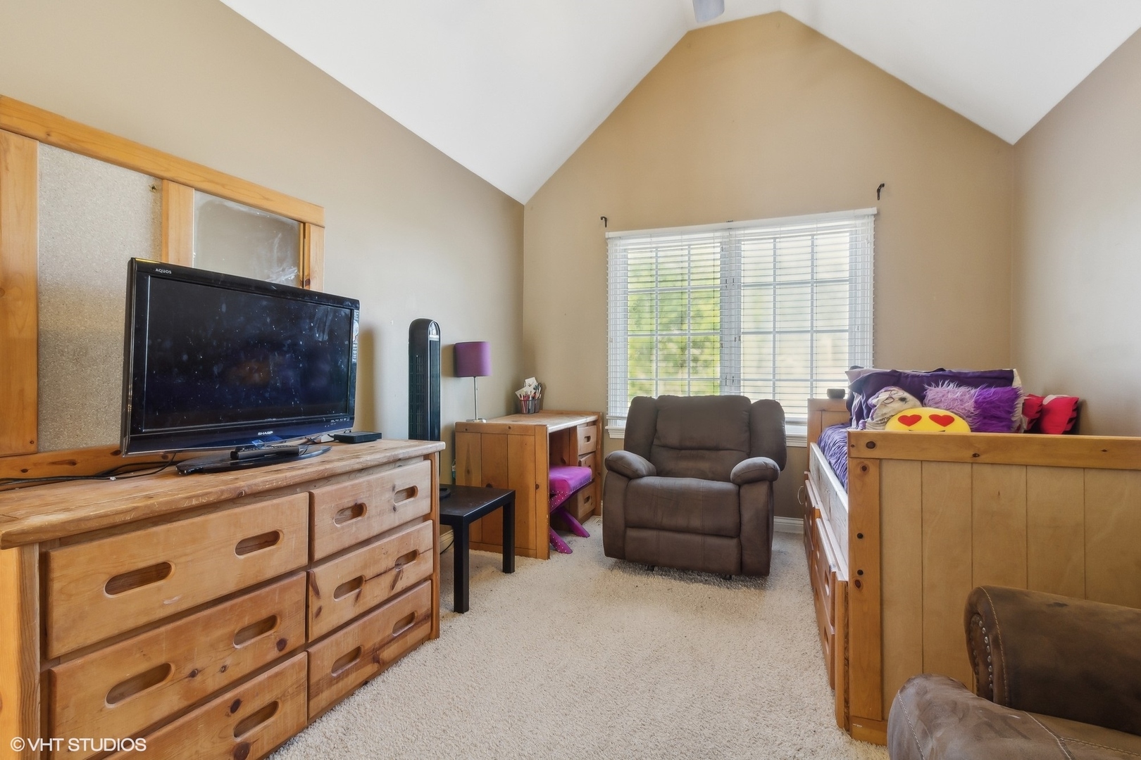 13765 Capista Drive Plainfield, IL 60544 - Photo 11 of 19 a living room with furniture and a flat screen tv