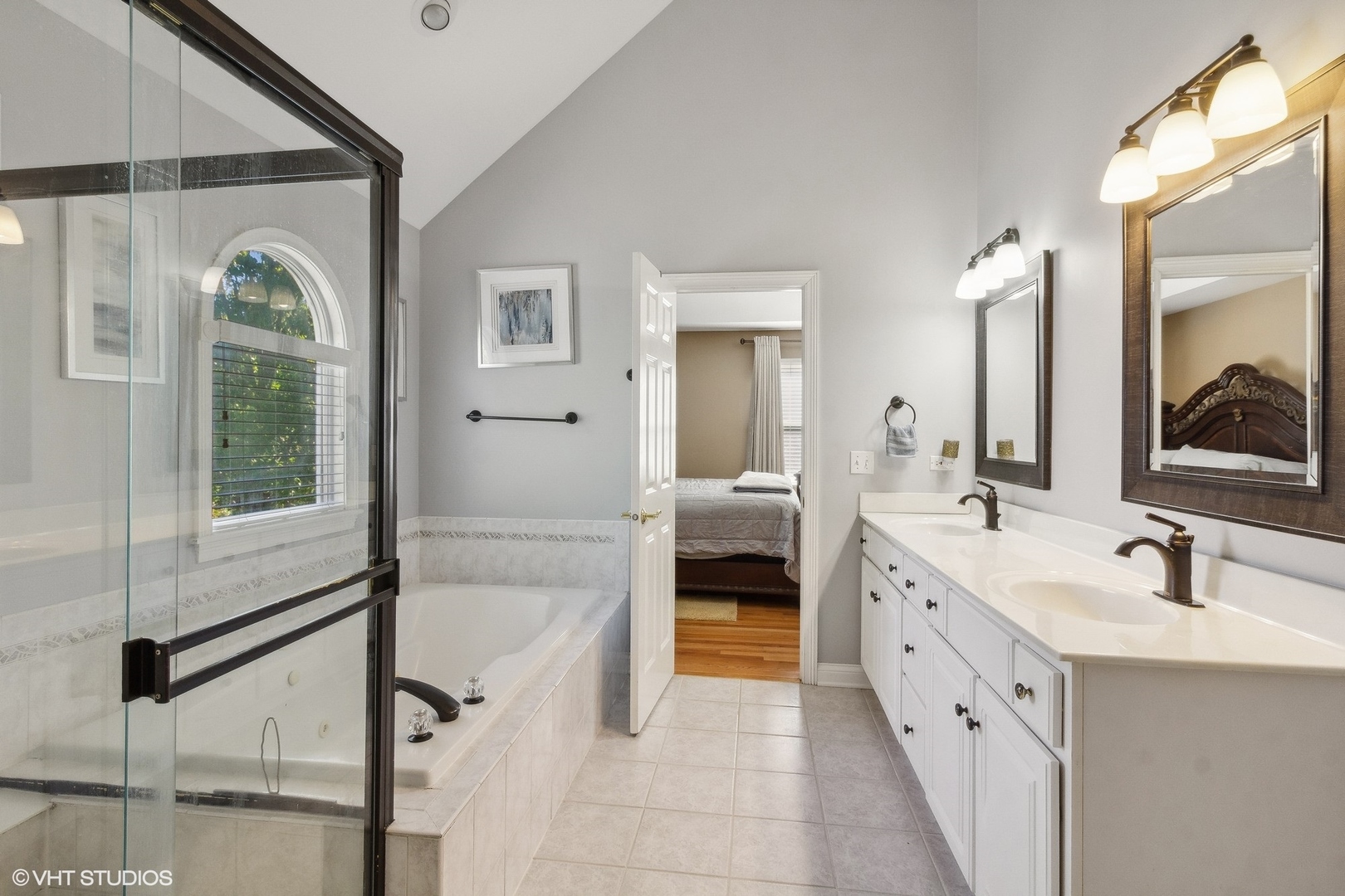 13765 Capista Drive Plainfield, IL 60544 - Photo 14 of 19 a spacious bathroom with a double vanity sink a mirror and next to a window