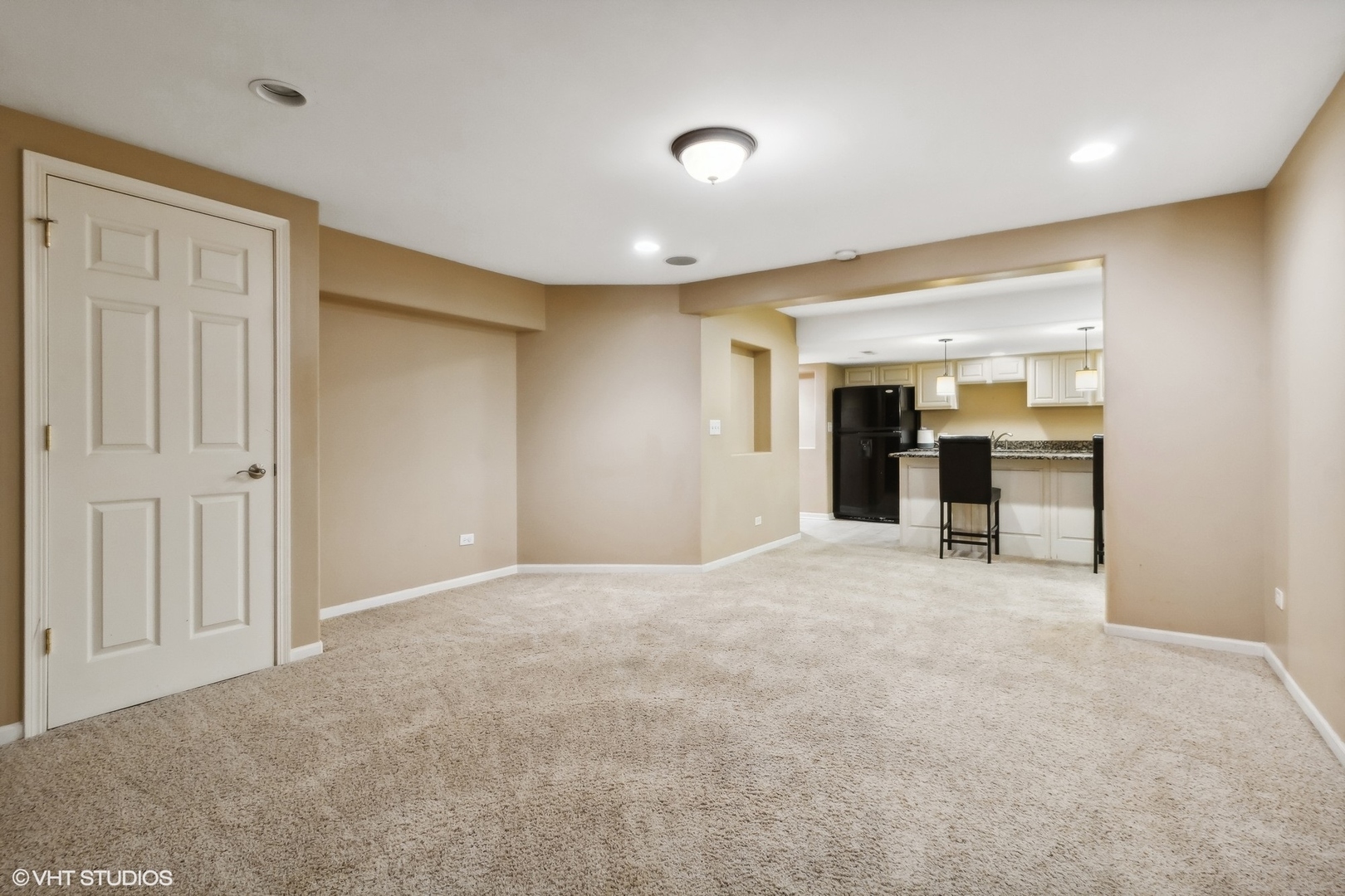 13765 Capista Drive Plainfield, IL 60544 - Photo 15 of 19 a view of an empty room with kitchen and a window