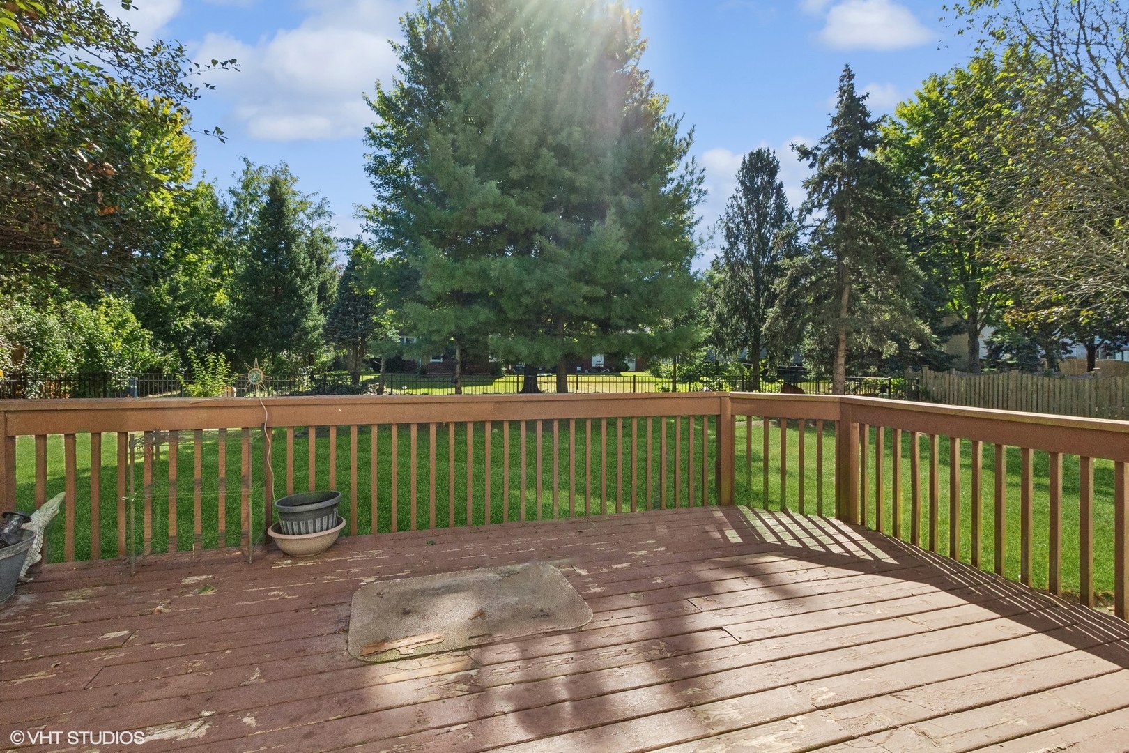 13765 Capista Drive Plainfield, IL 60544 - Photo 17 of 19 a view of a wooden roof deck
