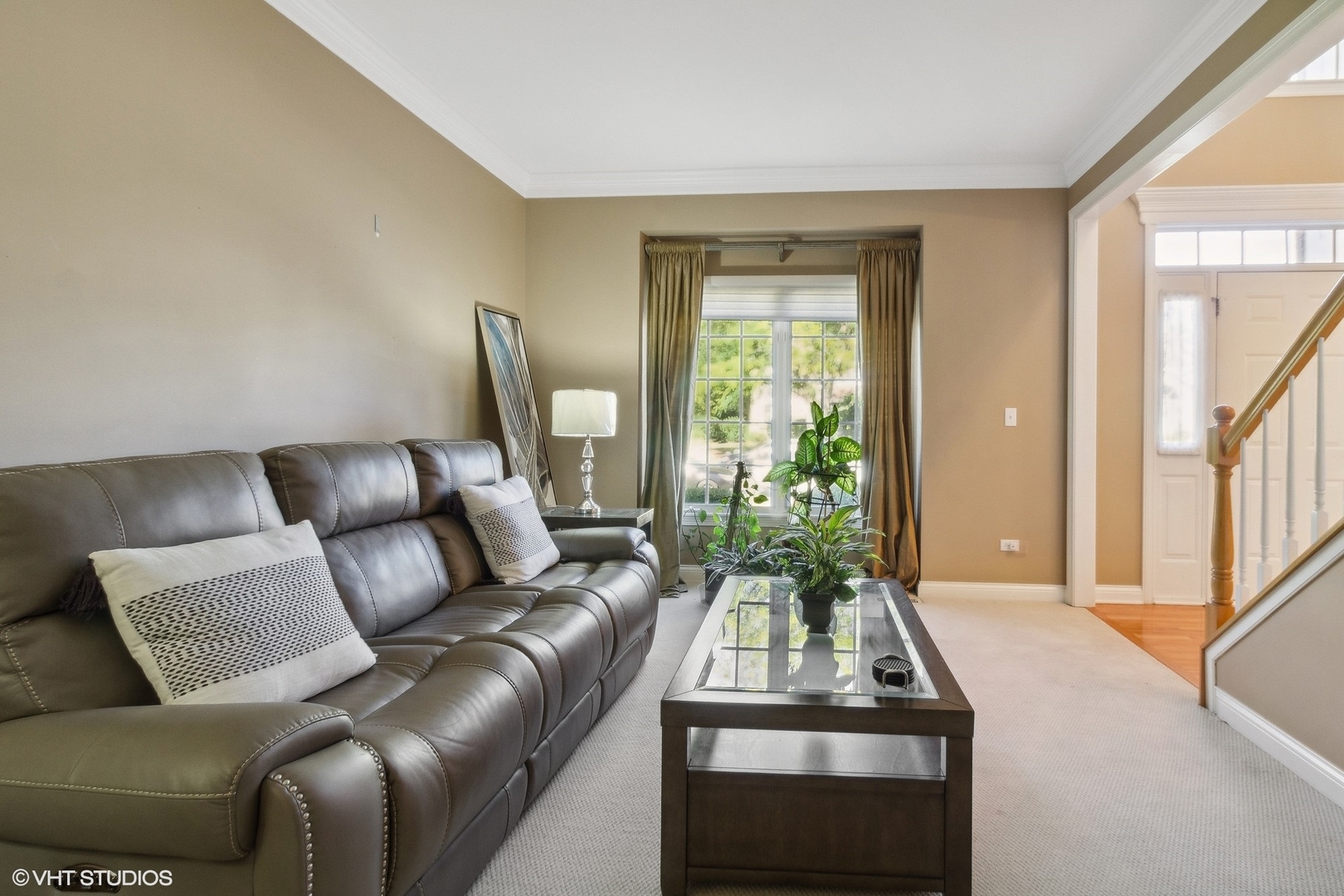 13765 Capista Drive Plainfield, IL 60544 - Photo 2 of 19 a living room with furniture and a large window