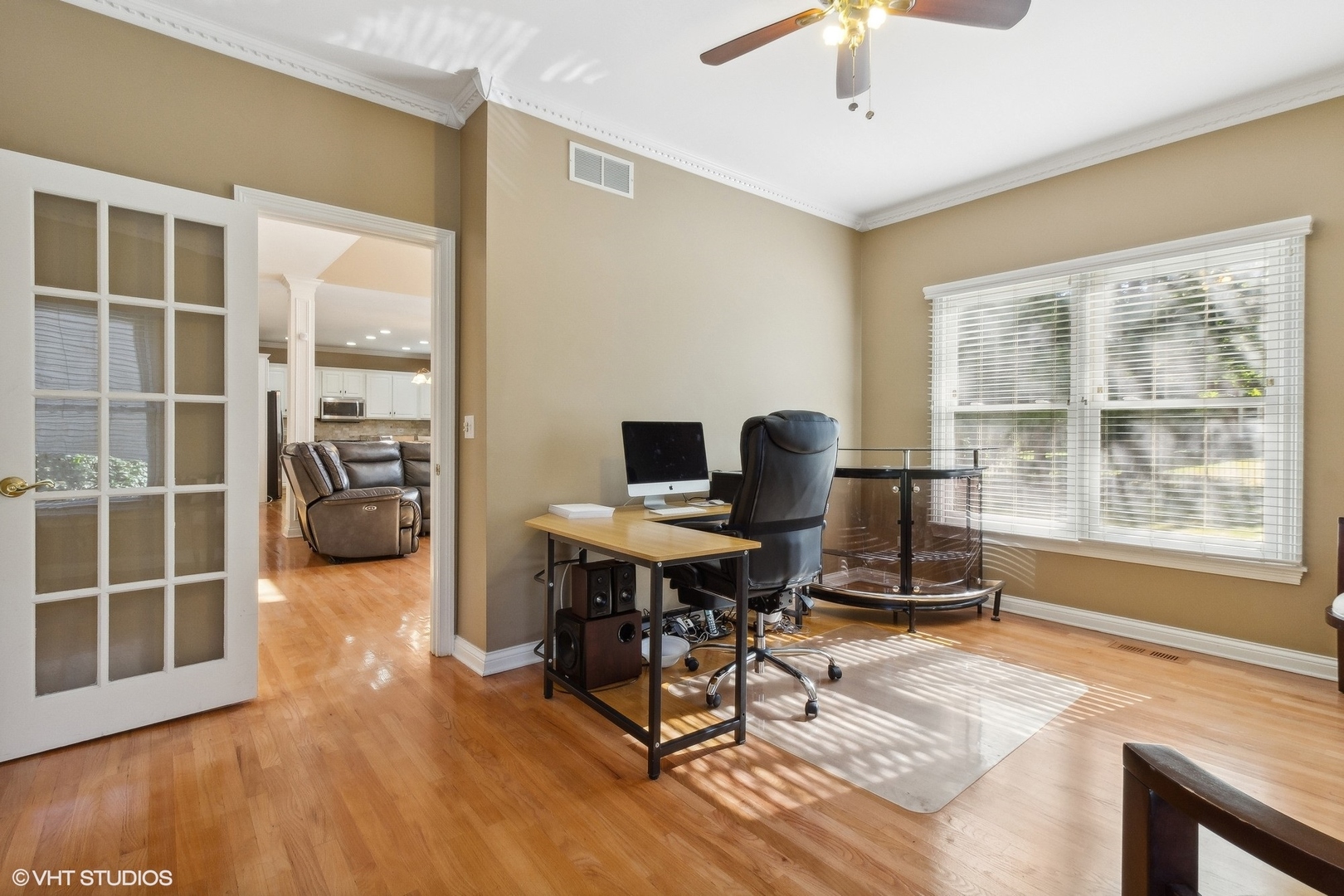 13765 Capista Drive Plainfield, IL 60544 - Photo 7 of 19 a view of a workspace with furniture and a window