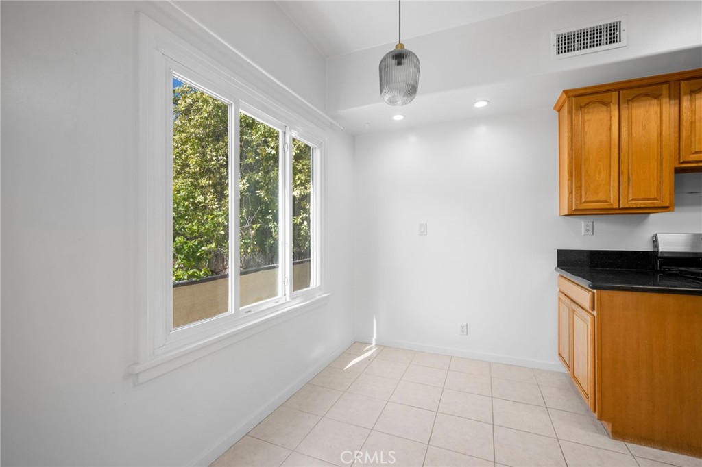 216 East Windsor Road, Unit 2 Glendale, CA 91205 - Photo 8 of 20 a view of an empty room with a window