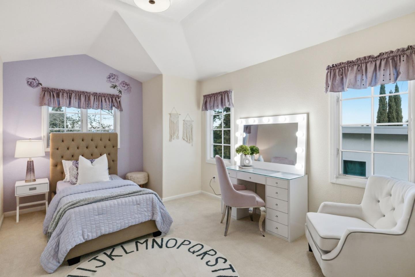 418 Ridge Road San Carlos, CA 94070 - Photo 32 of 64 a bedroom with a bed and a table