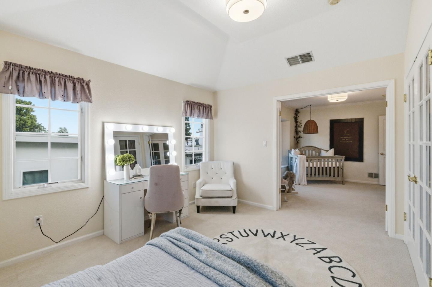 418 Ridge Road San Carlos, CA 94070 - Photo 33 of 64 a living room with furniture and a table