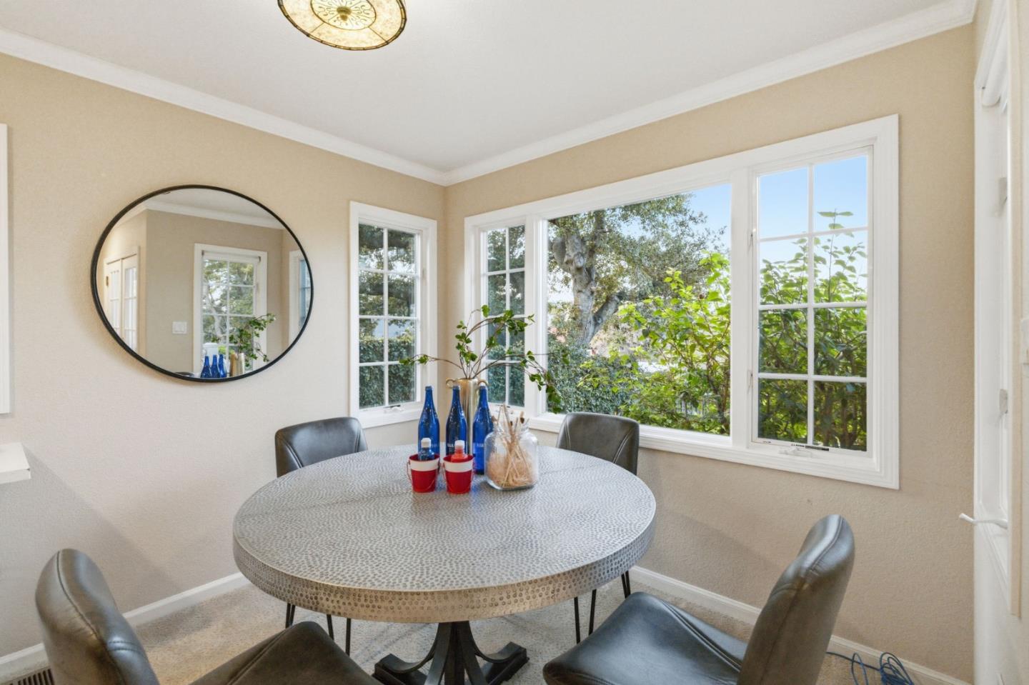 418 Ridge Road San Carlos, CA 94070 - Photo 39 of 64 a dining room with furniture and a window
