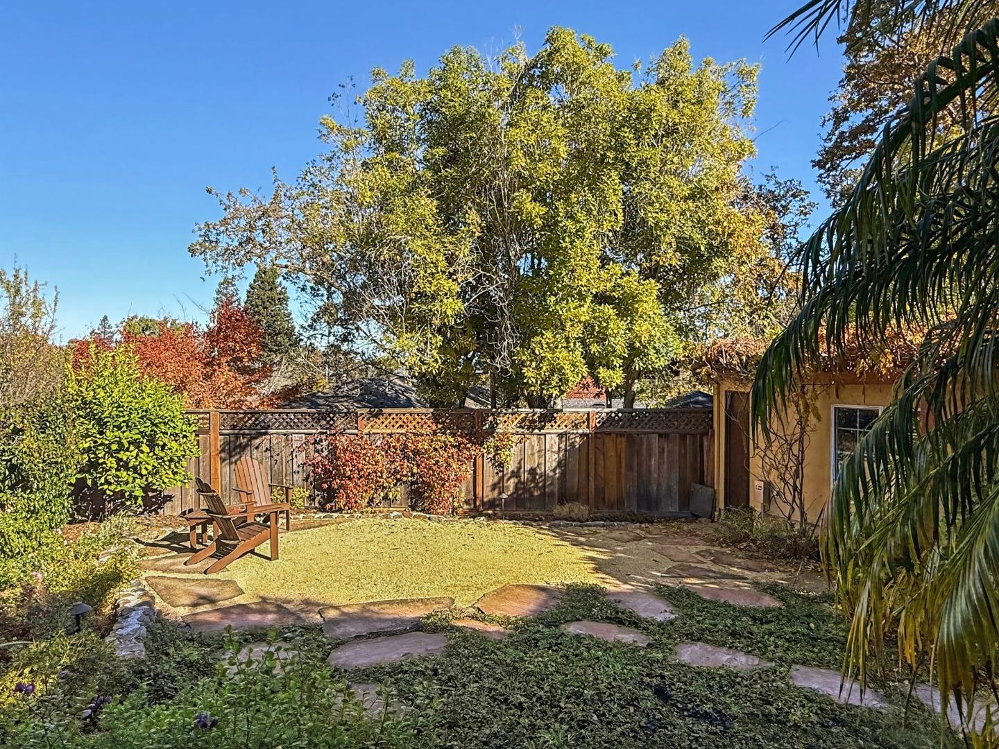 418 Ridge Road San Carlos, CA 94070 - Photo 54 of 64 a view of a backyard with large tree
