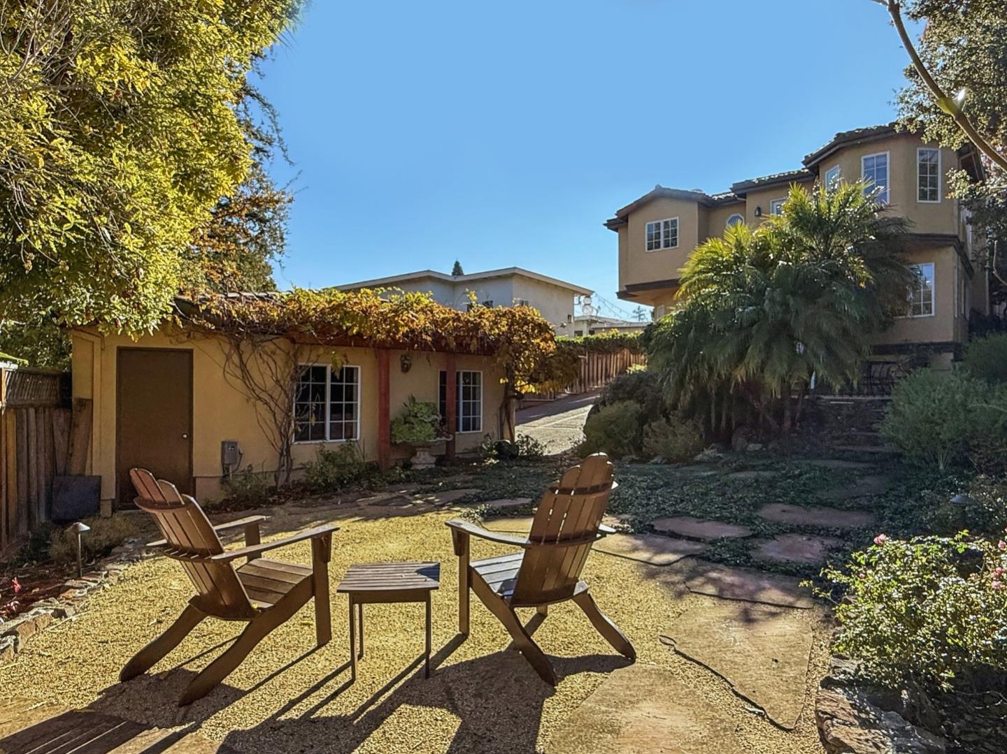 418 Ridge Road San Carlos, CA 94070 - Photo 55 of 64 a view of house with backyard and furniture