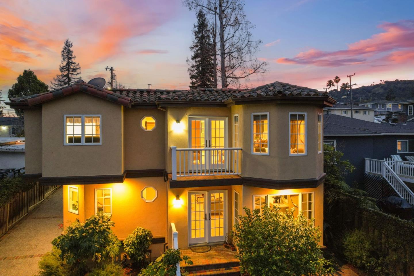 418 Ridge Road San Carlos, CA 94070 - Photo 60 of 64 a front view of a house with a yard