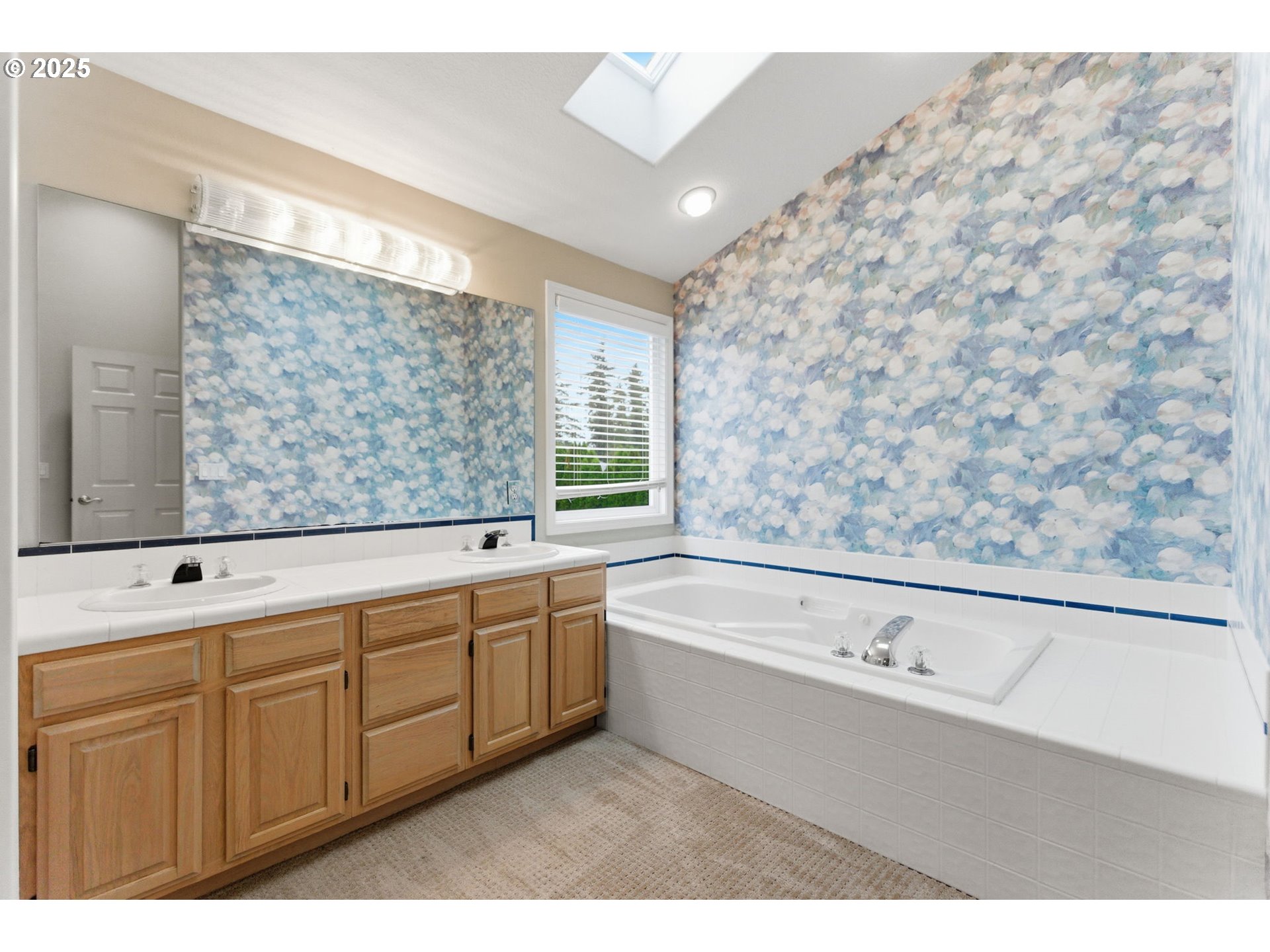 4753 Southeast 14th Street Gresham, OR 97080 - Photo 32 of 48 a bathroom with a bathtub sink and mirror