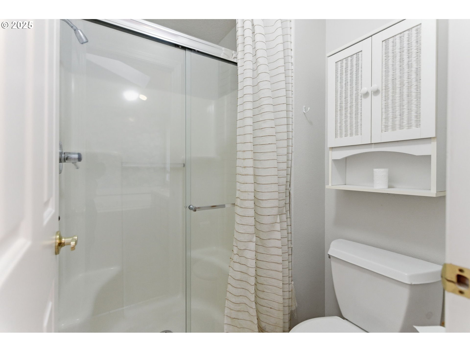 4753 Southeast 14th Street Gresham, OR 97080 - Photo 33 of 48 a bathroom with a shower and a toilet