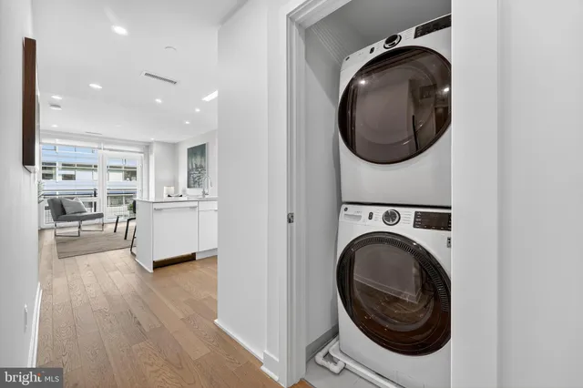 a view of a kitchen with washer and dryer
