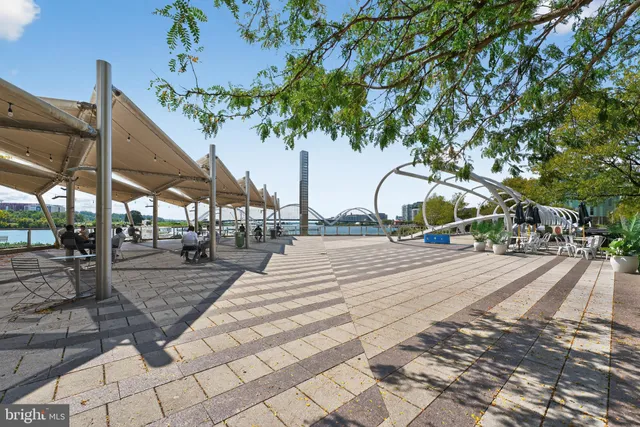 a view of a lake with outdoor seating