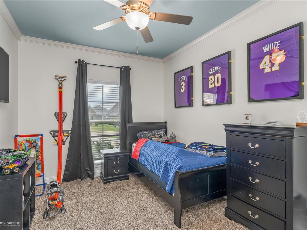 690 Lessie Drive Stonewall, LA 71078 - Photo 21 of 29 Spacious room featuring a centered window, light-colored walls, and a blue ceiling