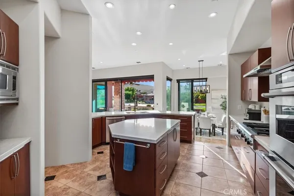a view of a dining room with furniture window and outside view