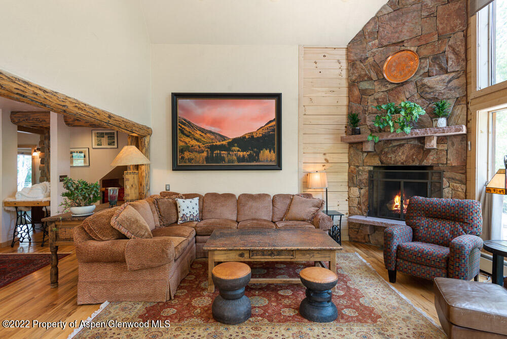73 Juniper Court Marble, CO 81623 - Photo 14 of 47 a living room with furniture and a fireplace
