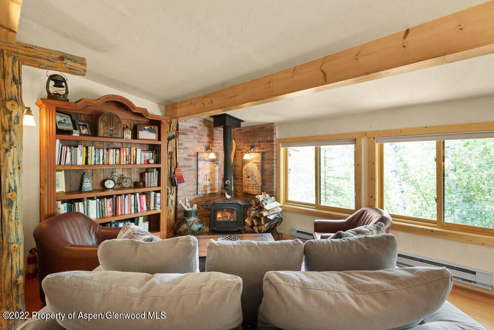 73 Juniper Court Marble, CO 81623 - Photo 22 of 47 a living room with furniture and a large window