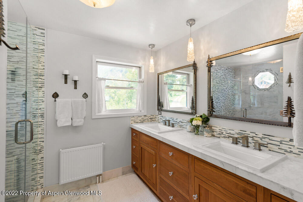 73 Juniper Court Marble, CO 81623 - Photo 24 of 47 a bathroom with a double vanity sink mirror and double