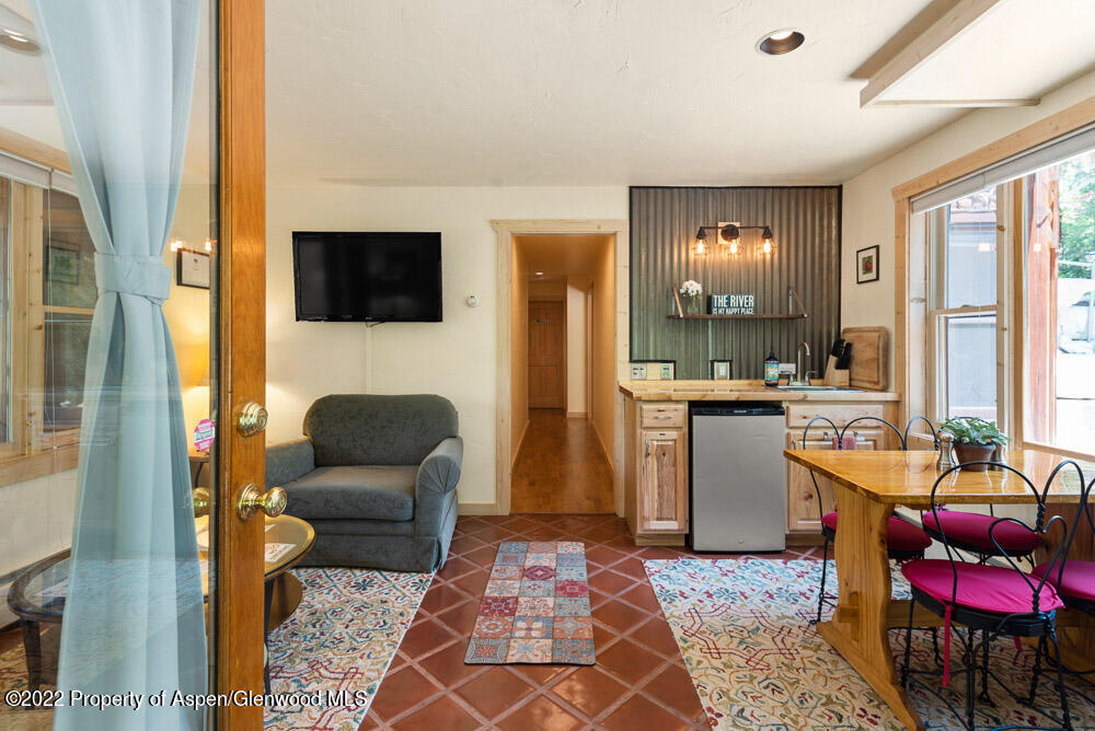 73 Juniper Court Marble, CO 81623 - Photo 34 of 47 a living room with furniture and a flat screen tv
