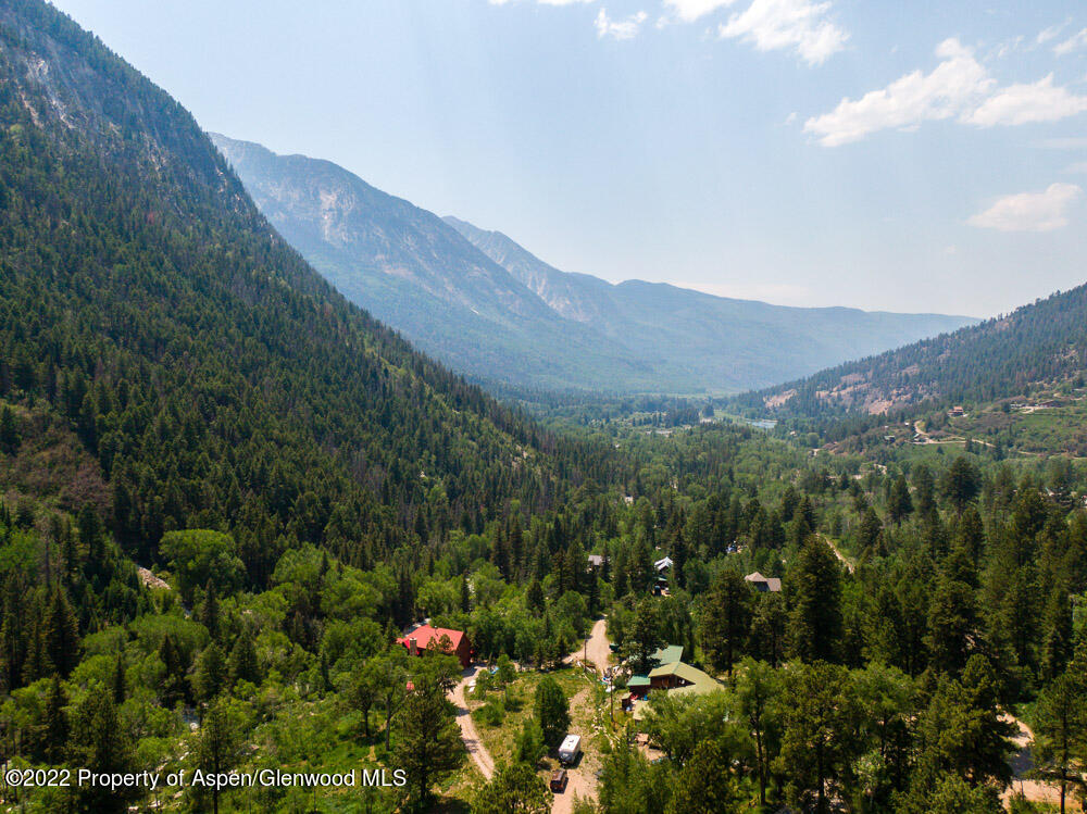73 Juniper Court Marble, CO 81623 - Photo 44 of 47 a view of a house with a mountain in the background