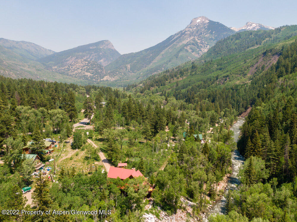 73 Juniper Court Marble, CO 81623 - Photo 46 of 47 a view of a lush green hillside and a mountain
