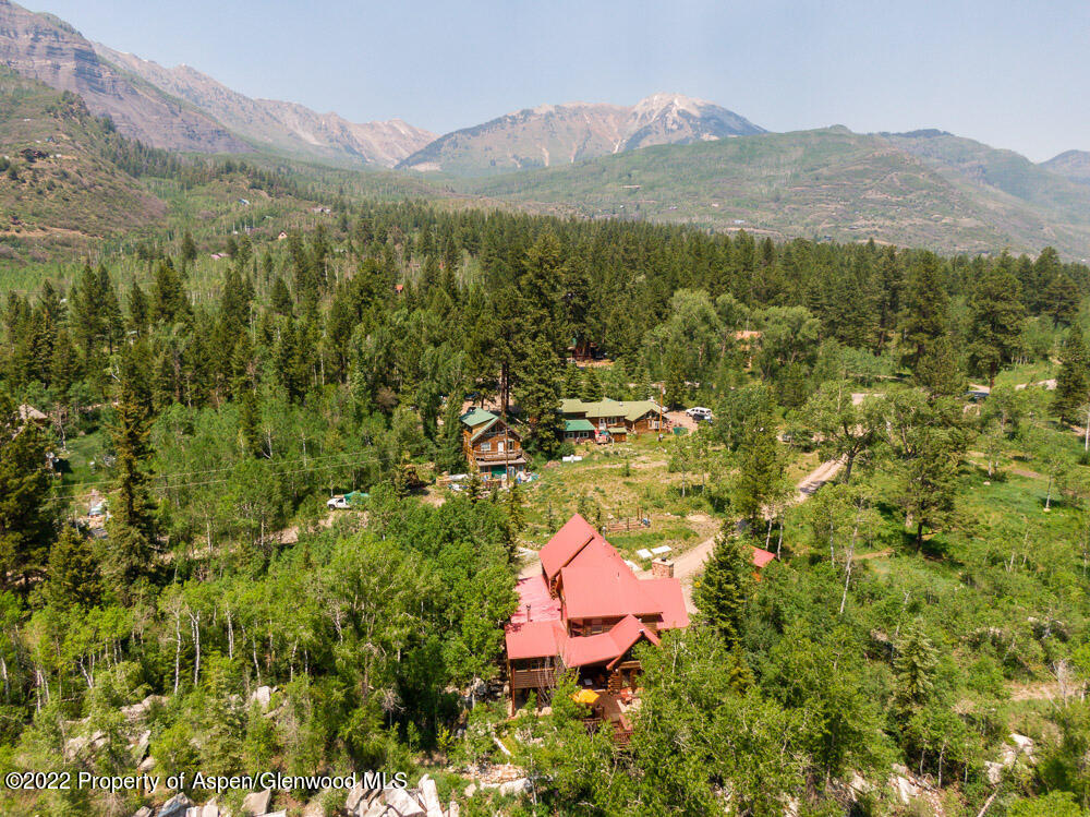 73 Juniper Court Marble, CO 81623 - Photo 47 of 47 a view of a lush green hillside and houses
