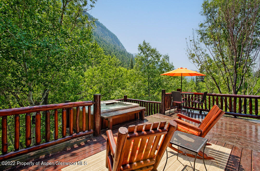 73 Juniper Court Marble, CO 81623 - Photo 7 of 47 a view of a patio with two chairs and a table