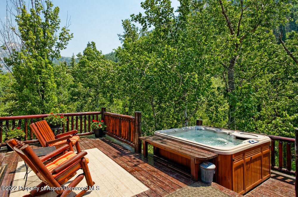 73 Juniper Court Marble, CO 81623 - Photo 9 of 47 a view of a patio with a table and chairs