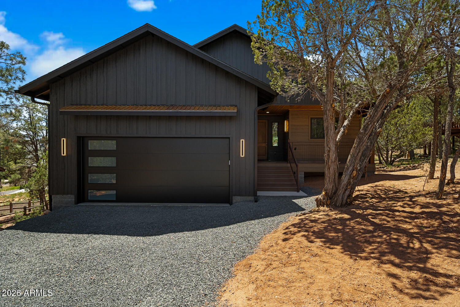 2235 Par Place Overgaard, AZ 85933 - Photo 1 of 42 a front view of a house with a yard
