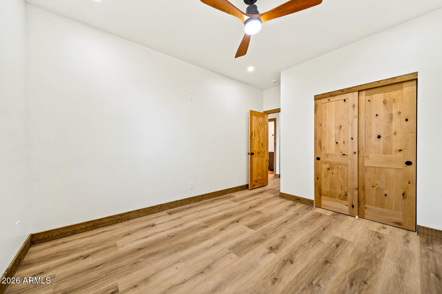 2235 Par Place Overgaard, AZ 85933 - Photo 24 of 42 wooden floor in an empty room