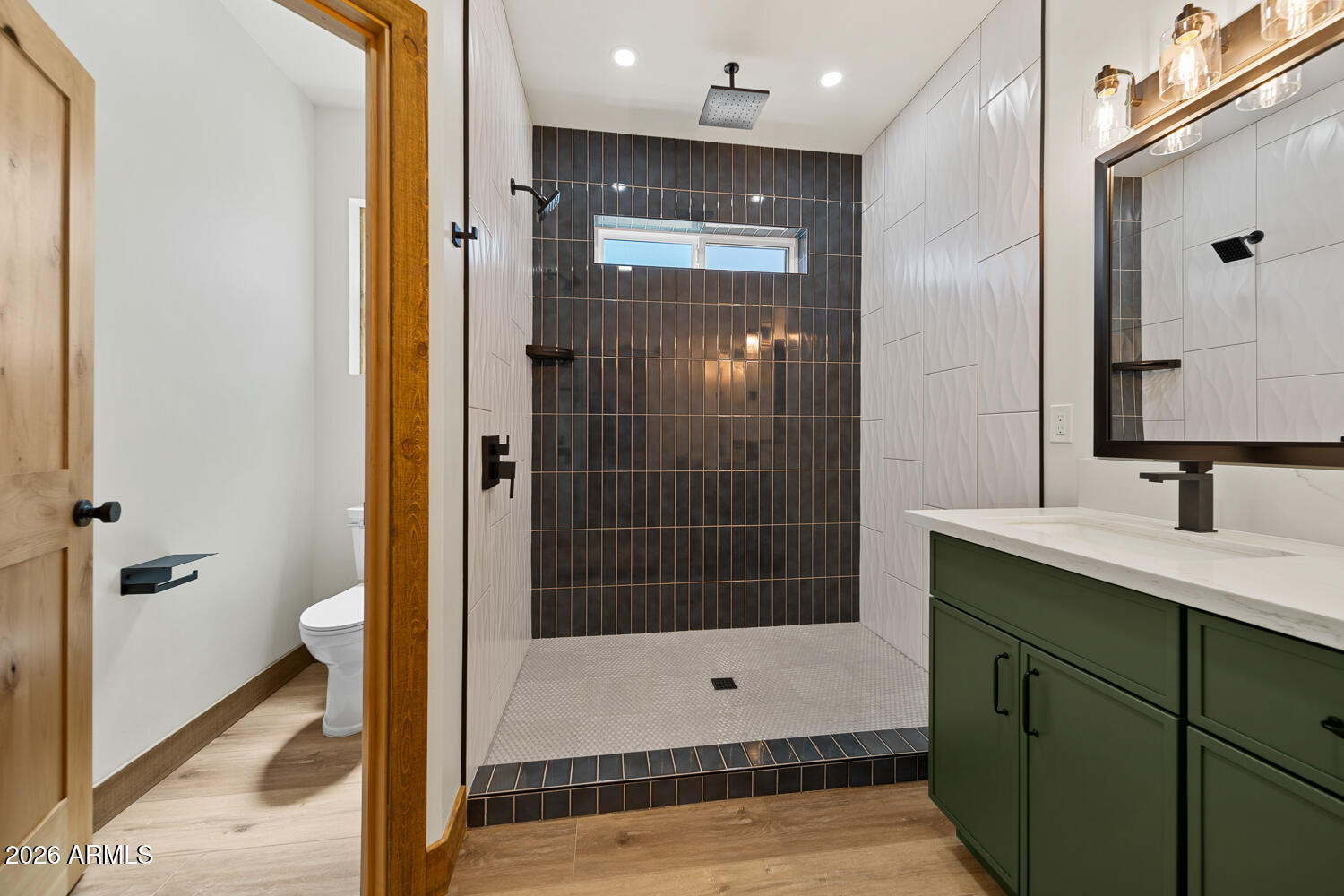 2235 Par Place Overgaard, AZ 85933 - Photo 30 of 42 a bathroom with a shower and a sink