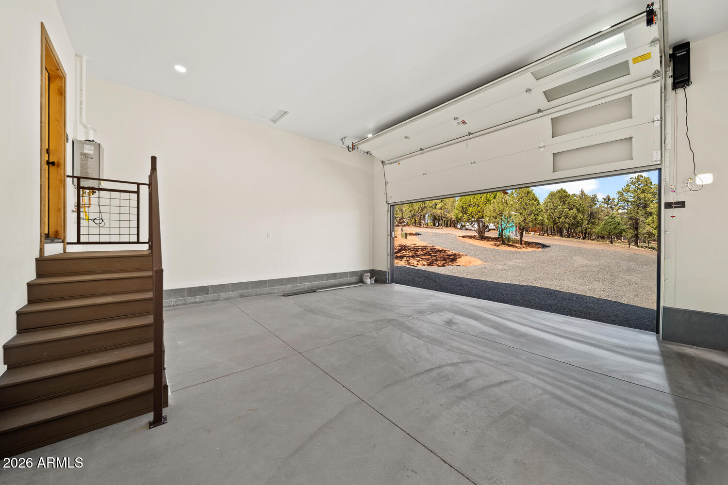 2235 Par Place Overgaard, AZ 85933 - Photo 34 of 42 a view of a room with wooden floor and window