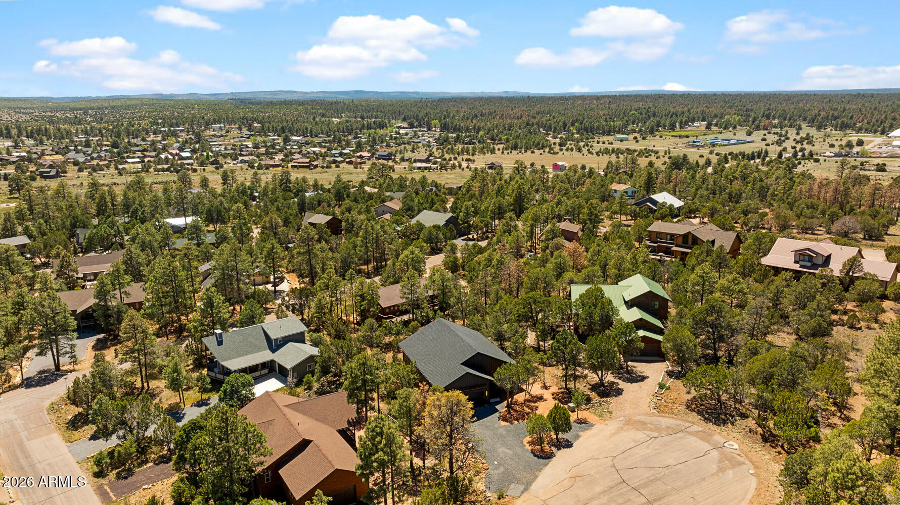 2235 Par Place Overgaard, AZ 85933 - Photo 38 of 42 an aerial view of residential houses with outdoor space