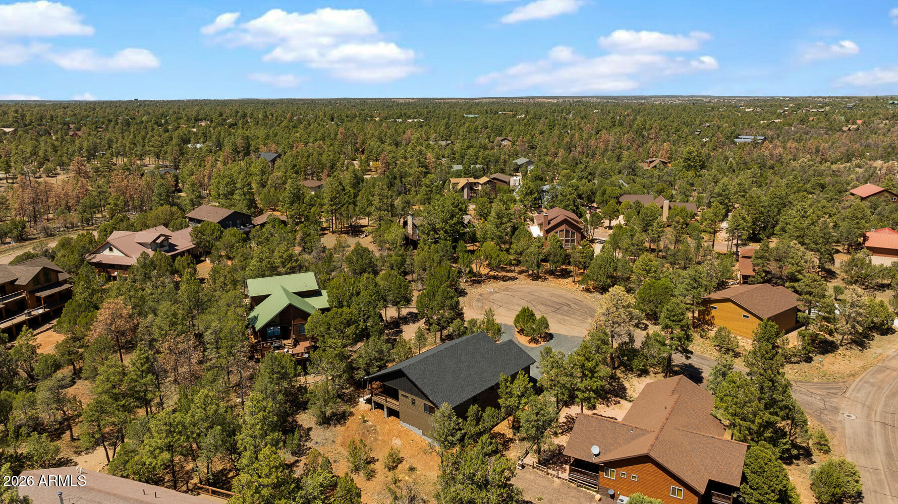 2235 Par Place Overgaard, AZ 85933 - Photo 40 of 42 an aerial view of residential houses with outdoor space and ocean view