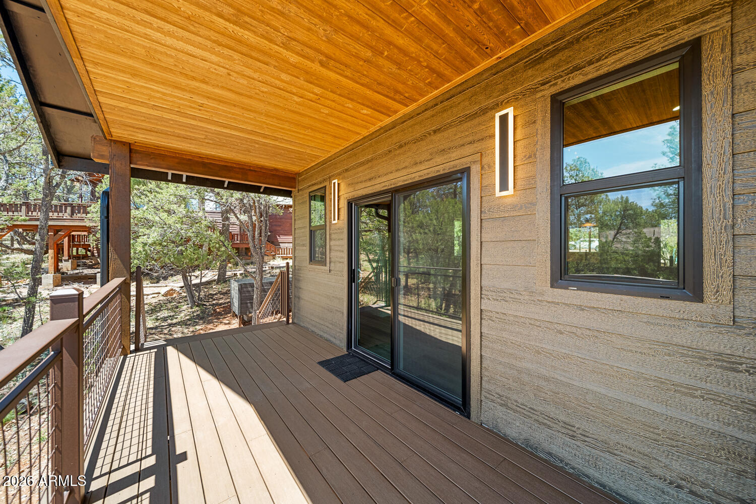 2235 Par Place Overgaard, AZ 85933 - Photo 8 of 42 a view of a balcony with wooden floor