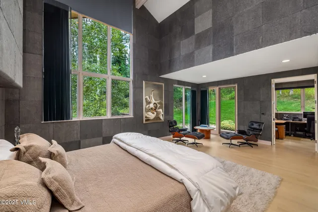 a room with furniture and a large window