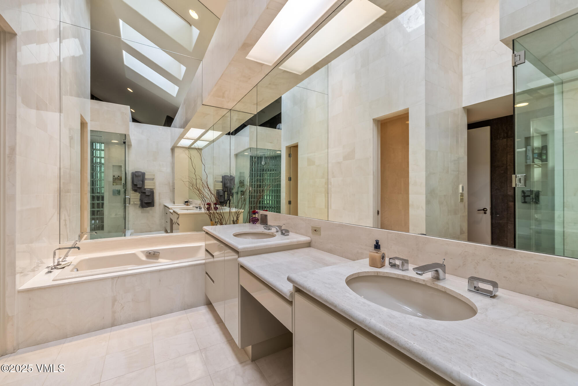 334 Borders Road Beaver Creek, CO 81620 - Photo 29 of 62 a bathroom with double vanity sinks double vanity and a bathtub