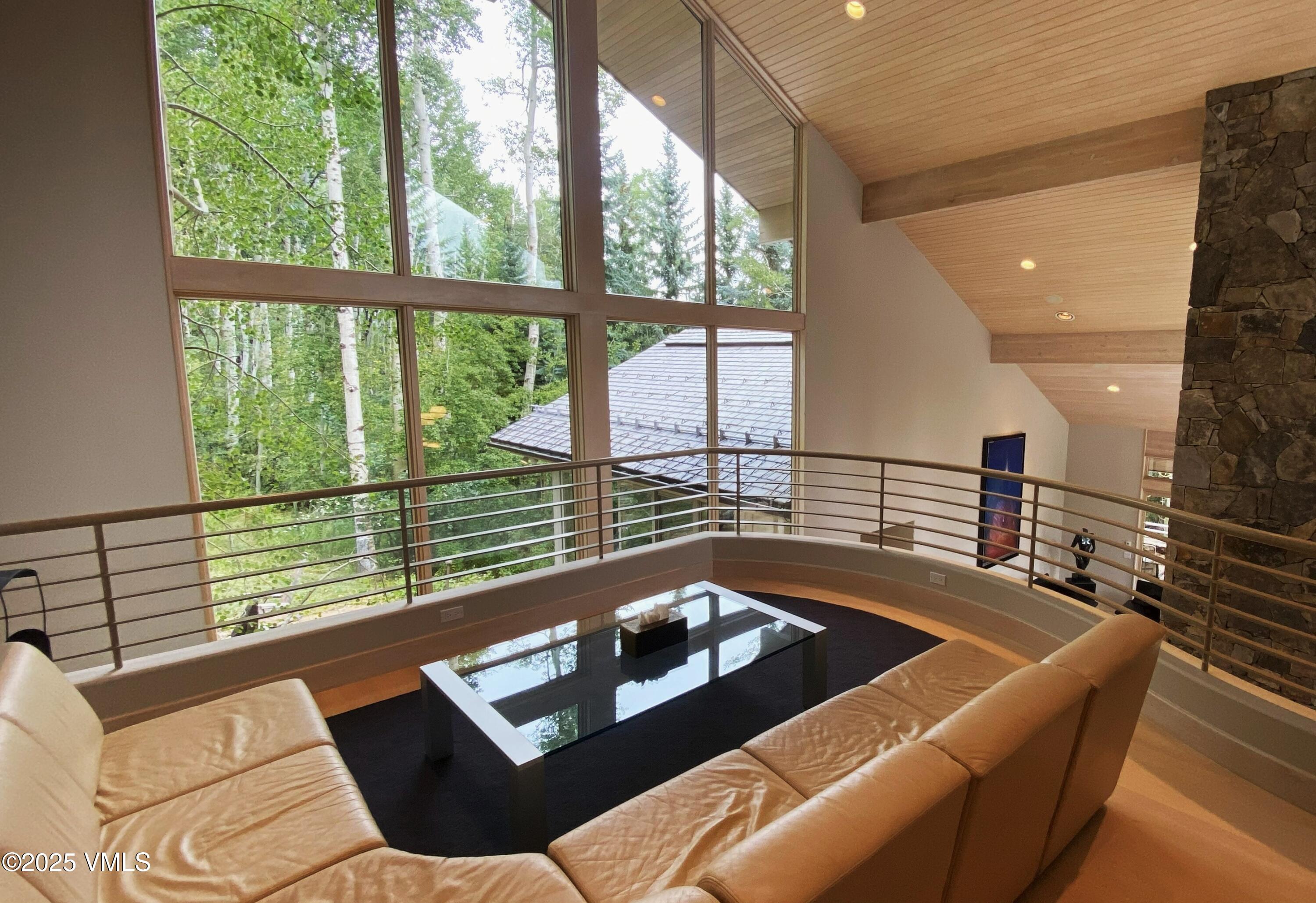 334 Borders Road Beaver Creek, CO 81620 - Photo 30 of 62 a living room with furniture and a large window