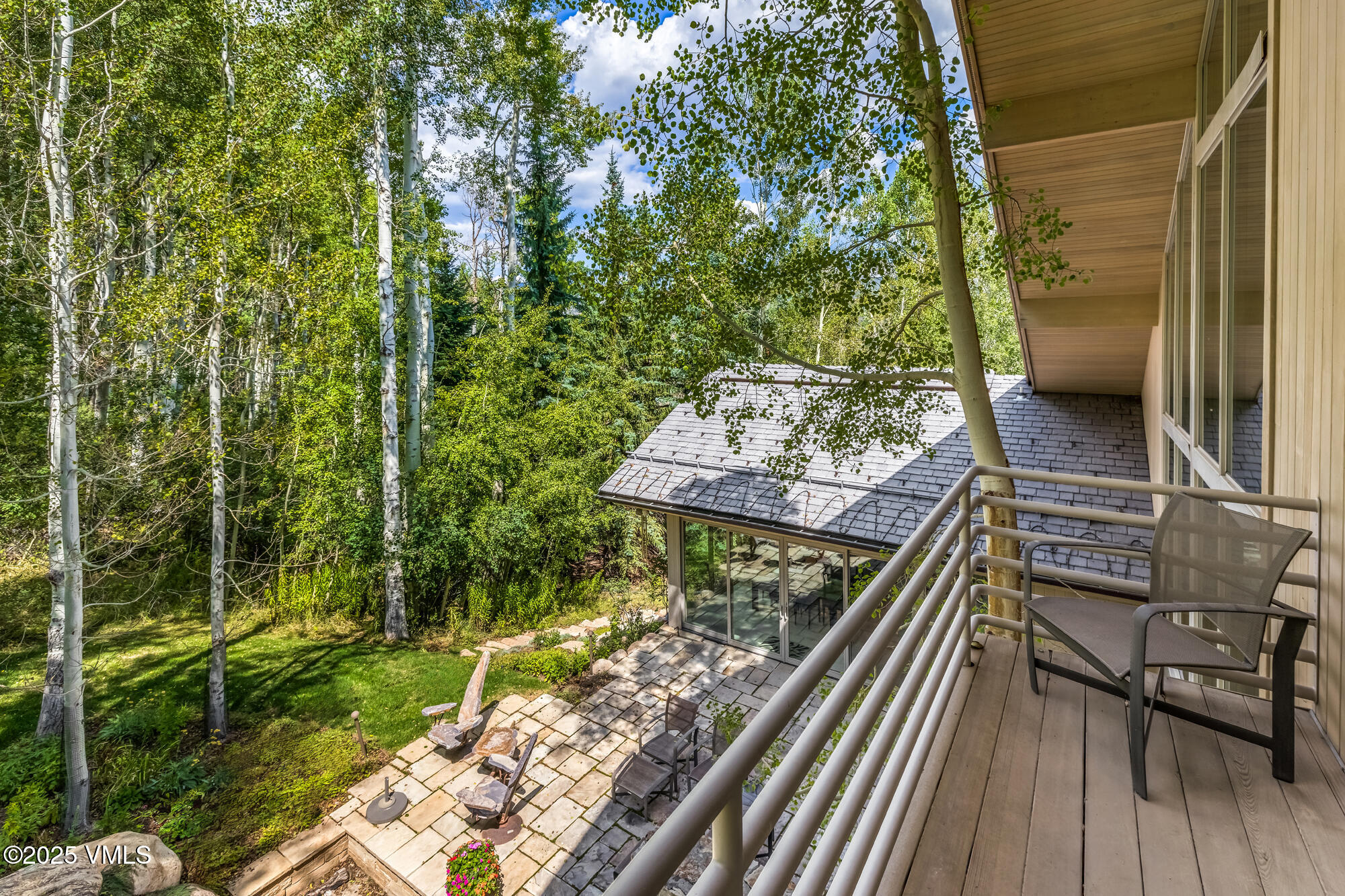 334 Borders Road Beaver Creek, CO 81620 - Photo 36 of 62 a view of a balcony with wooden floor and fence