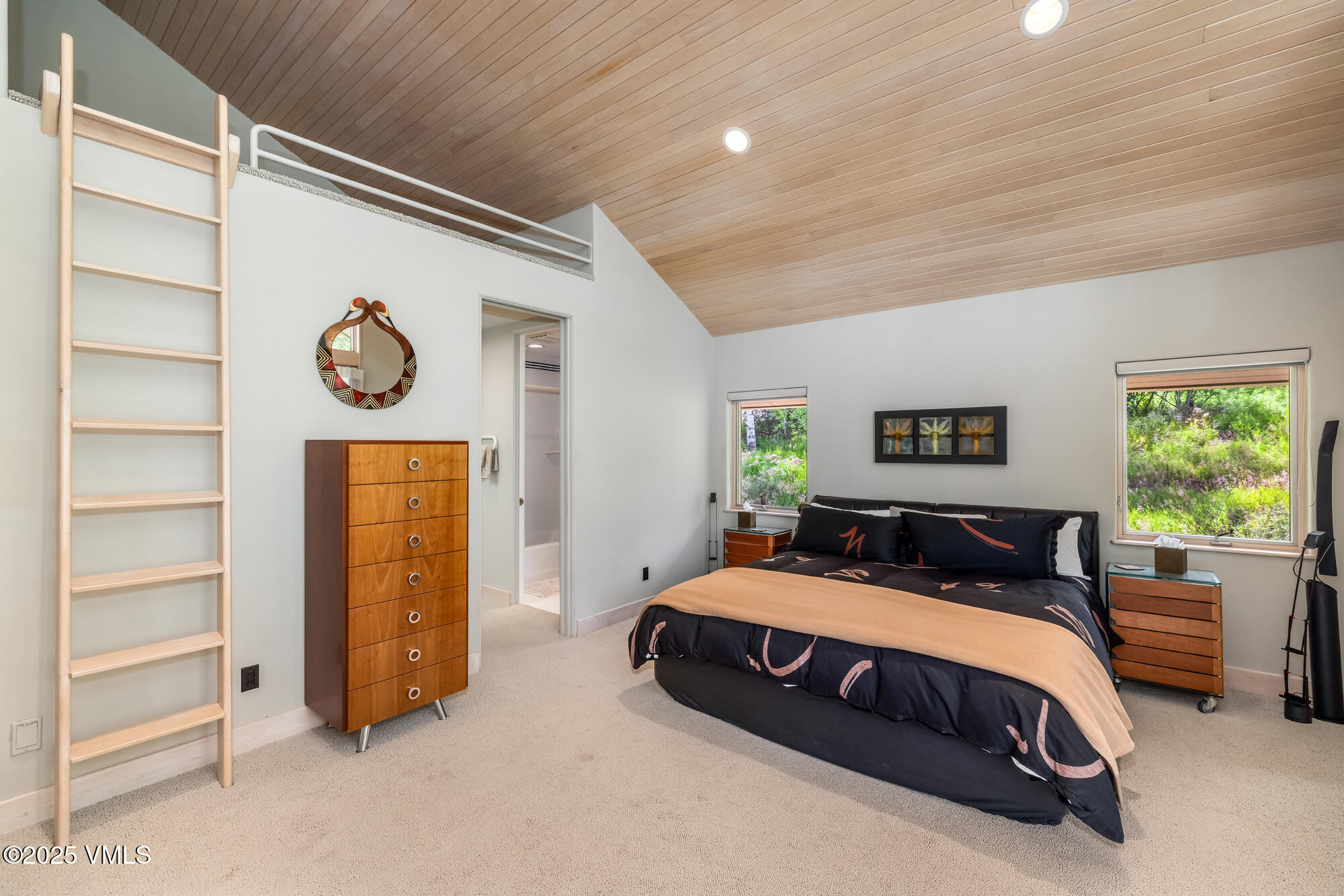 334 Borders Road Beaver Creek, CO 81620 - Photo 37 of 62 a bedroom with a bed and a window