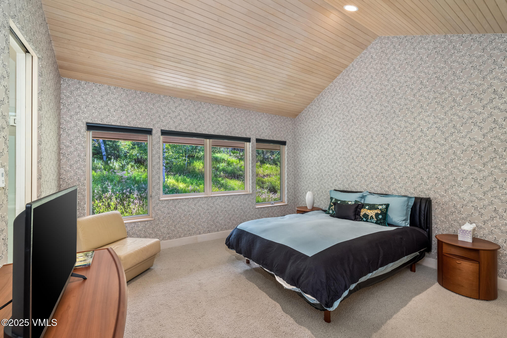 334 Borders Road Beaver Creek, CO 81620 - Photo 39 of 62 a bedroom with a bed and large window