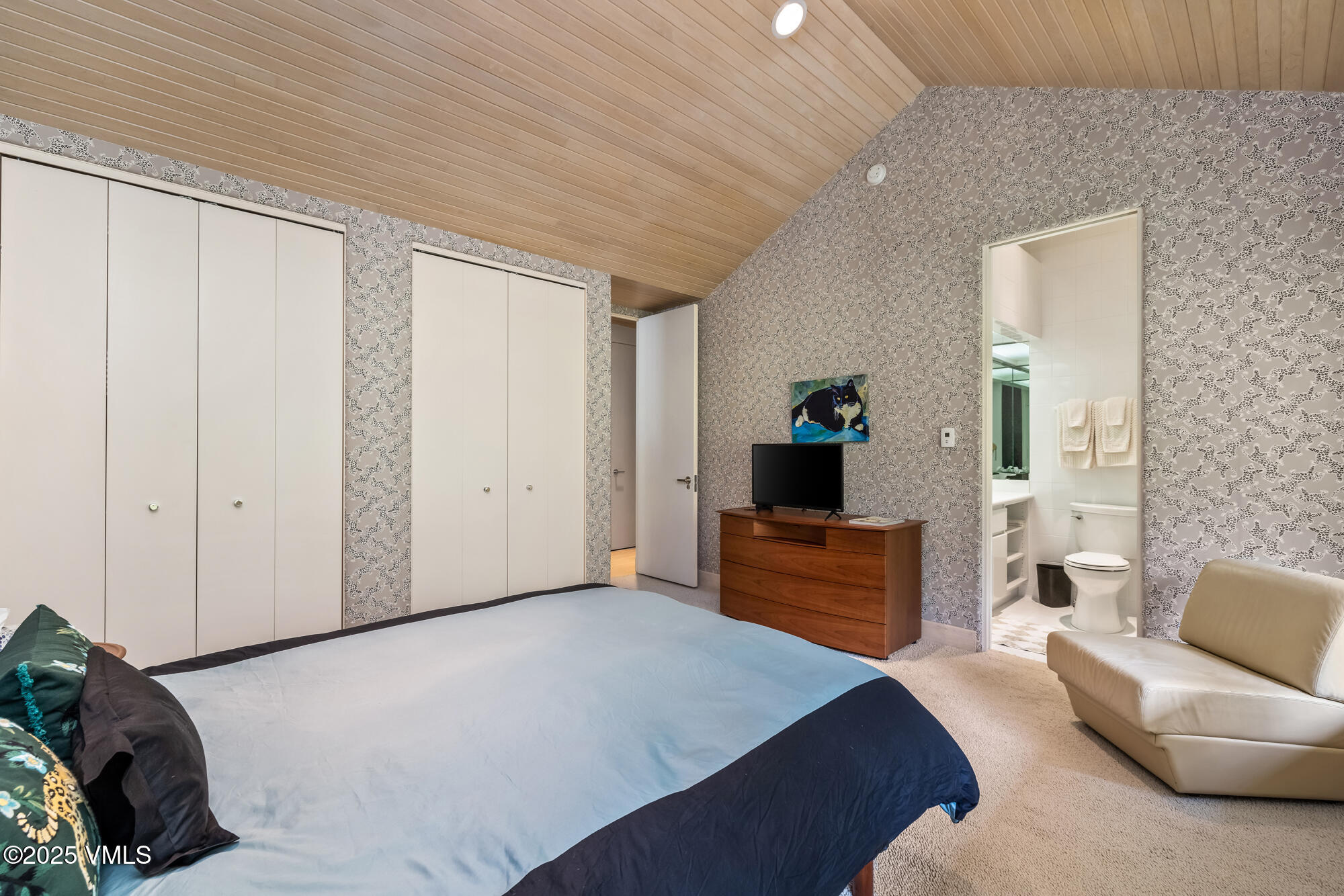 334 Borders Road Beaver Creek, CO 81620 - Photo 40 of 62 a bedroom with furniture and a wooden floor