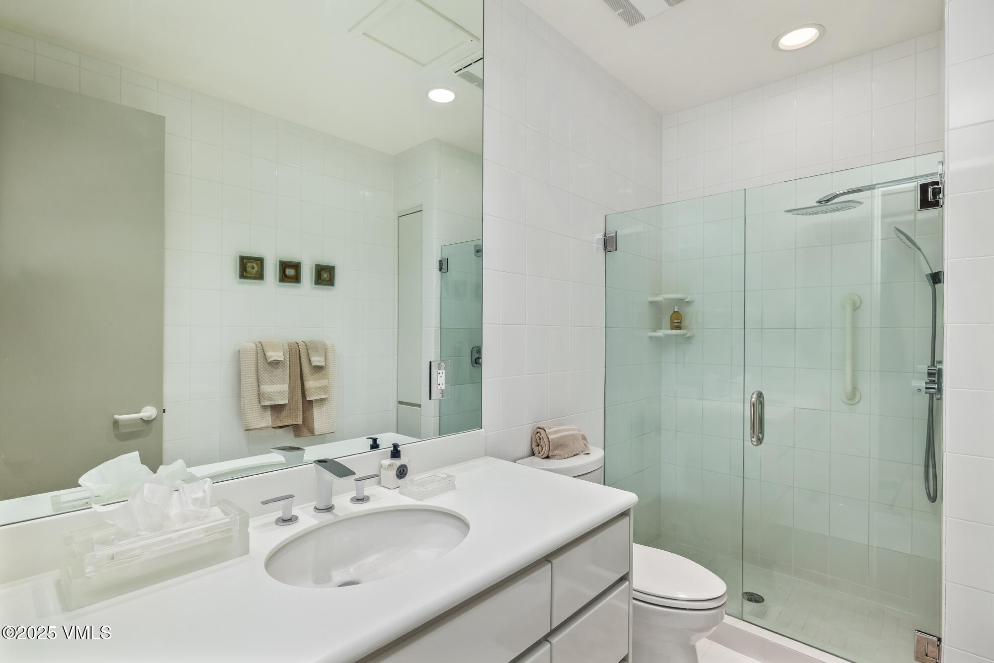 334 Borders Road Beaver Creek, CO 81620 - Photo 44 of 62 a bathroom with a sink toilet and shower