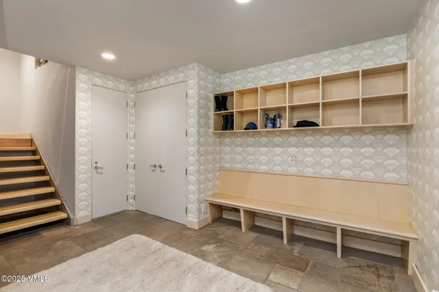 a view of a lush green forest with a houses