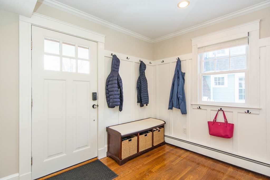 1289 Walnut Street Newton, MA 02461 - Photo 14 of 42 a bedroom with furniture and a window