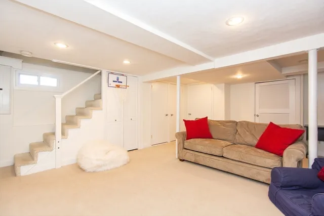 a living room with furniture and a couch