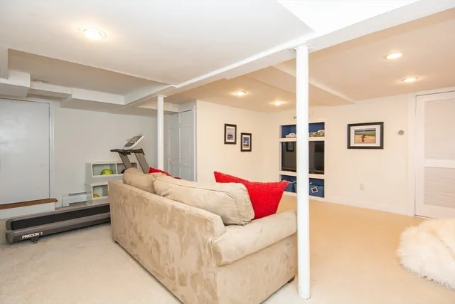 a living room with furniture and a table