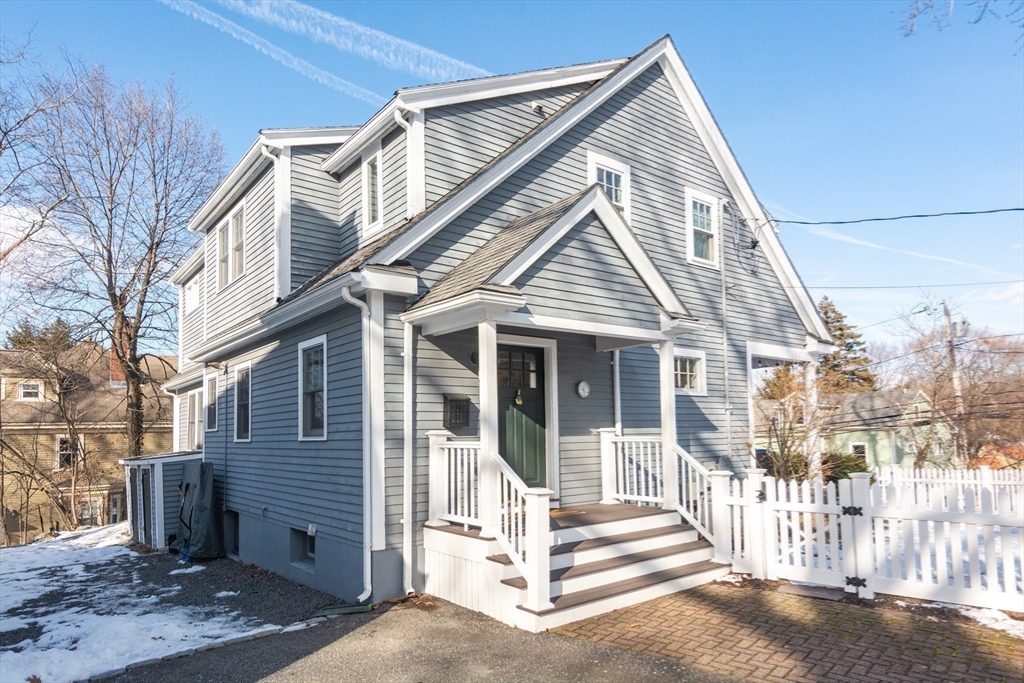 1289 Walnut Street Newton, MA 02461 - Photo 35 of 42 a front view of a house with a porch