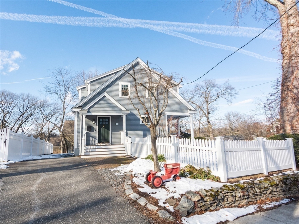 1289 Walnut Street Newton, MA 02461 - Photo 37 of 42 a front view of a house with a tree